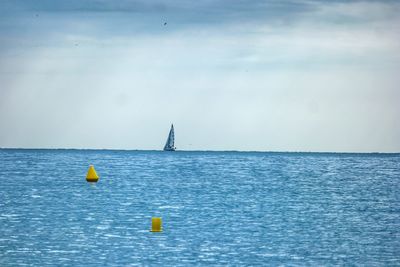 View of blue sea against sky