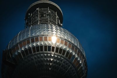 Low angle view of skyscraper against clear sky