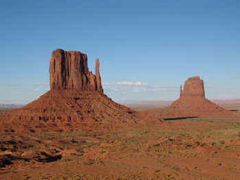 Rock formations in desert against sky