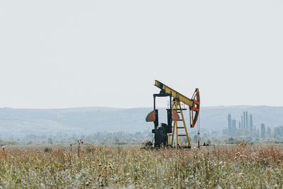 Oil well pump on field