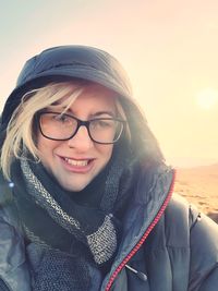 Portrait of smiling woman in snow