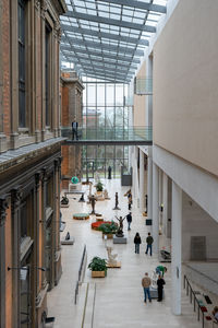 High angle view of people walking at airport