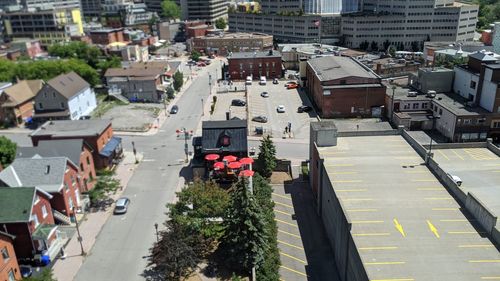 High angle view of street amidst buildings in city