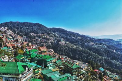 High angle view of townscape against sky-manali city, himachal pradesh, india