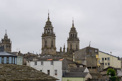 View of buildings in city against sky from the roman wall of lugo