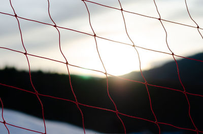 Full frame shot of fence against sky