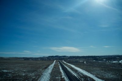 Railroad track against sky