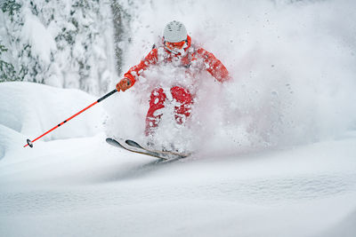 Person on snow covered mountain