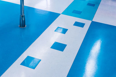 High angle view of swimming pool against blue sky