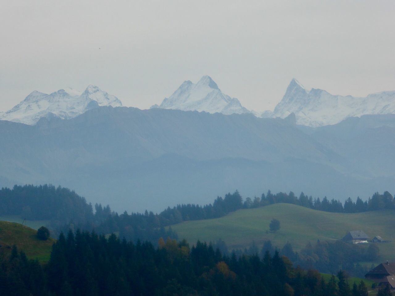 SCENIC VIEW OF MOUNTAINS IN FOGGY WEATHER