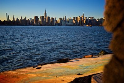 Sea and buildings in city