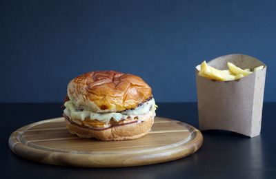 Close-up of fresh bread in plate on table