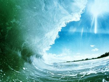 Scenic view of sea against blue sky