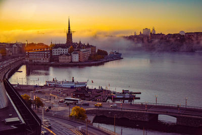High angle view of city at sunset