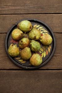 High angle view of fruits in bowl on table