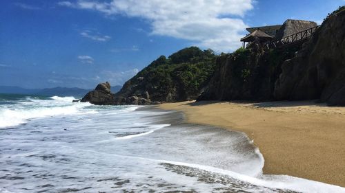 Scenic view of beach against sky