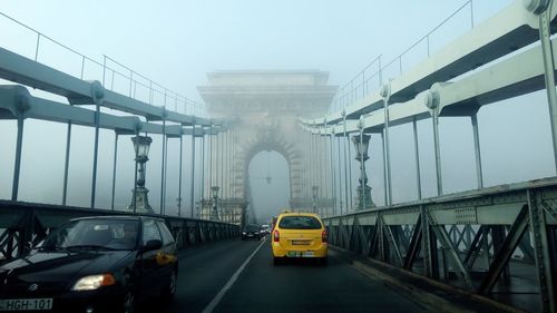 Road passing through city