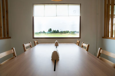 Empty chairs and table at home