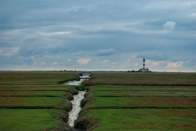 Scenic view of land against sky