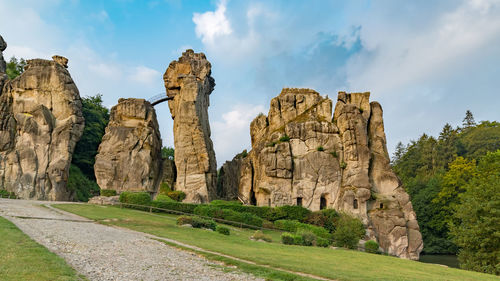 Panoramic view of rock formations against sky