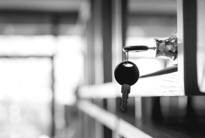 Closeup of the keys locked cabinet, black and white filter tone.