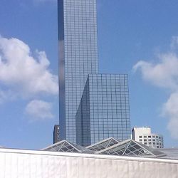 Low angle view of modern building against sky