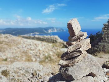 Close-up of stone stack on rock