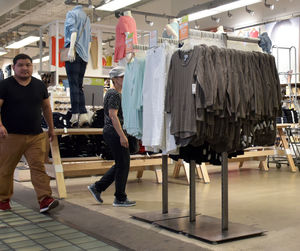 People standing in front of store