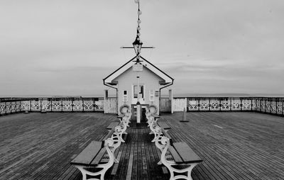 Pier over sea against sky