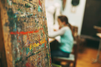 Side view of a woman against blurred background