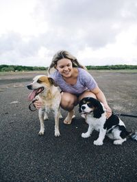 Full length of a young woman with dog