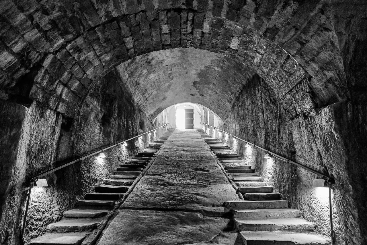 architecture, built structure, the way forward, arch, steps, steps and staircases, staircase, diminishing perspective, archway, stone wall, history, railing, building exterior, old, walkway, vanishing point, wall - building feature, day, indoors, leading