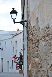 Street light on wall of building