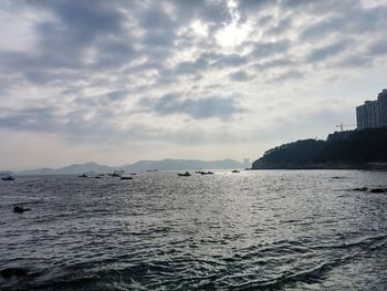 Scenic view of sea against cloudy sky