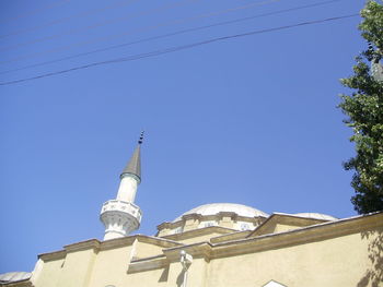 Low angle view of cathedral against clear blue sky