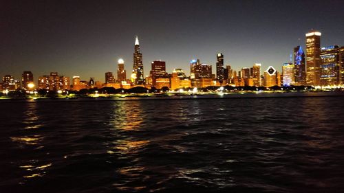 Illuminated cityscape at night