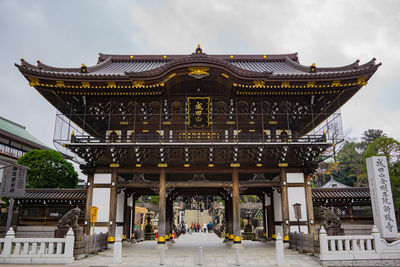 Exterior of temple building against sky