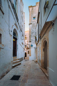 Narrow alley amidst buildings in town