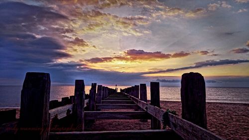 Scenic view of sea against sky at sunset