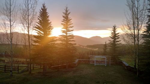 Scenic view of landscape against sky during sunset