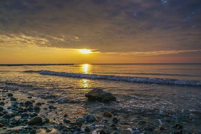 Scenic view of sea during sunset