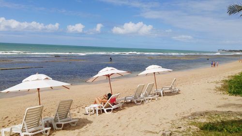 Scenic view of beach against sky