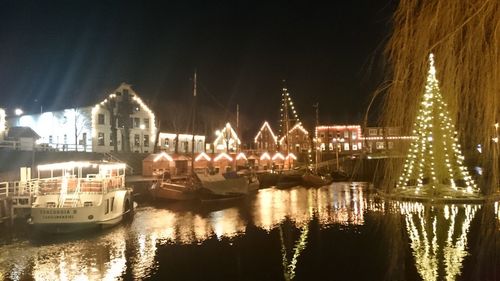 Boats moored at harbor