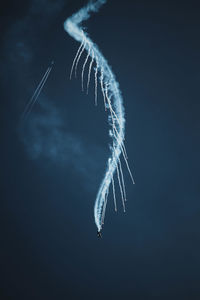 Low angle view of vapor trail against sky