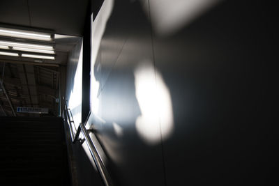 Shadow on surrounding wall at subway