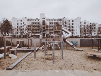 View of playground against buildings