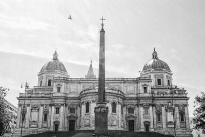 Low angle view of cathedral against cloudy sky