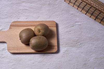 High angle view of eggs on cutting board