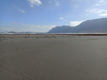 Scenic view of beach against sky