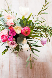 Close-up of pink roses on table